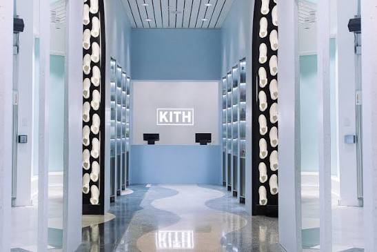 Kith Miami Beach interior with a pale blue arched hallway